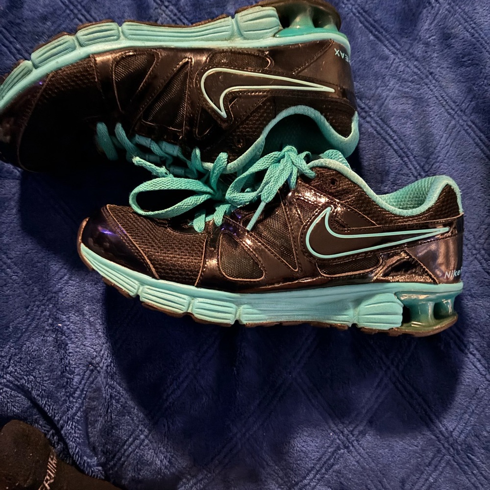 Women’s size 8.5 (mens 7) Nike Reax Rocket 2 running sneakers